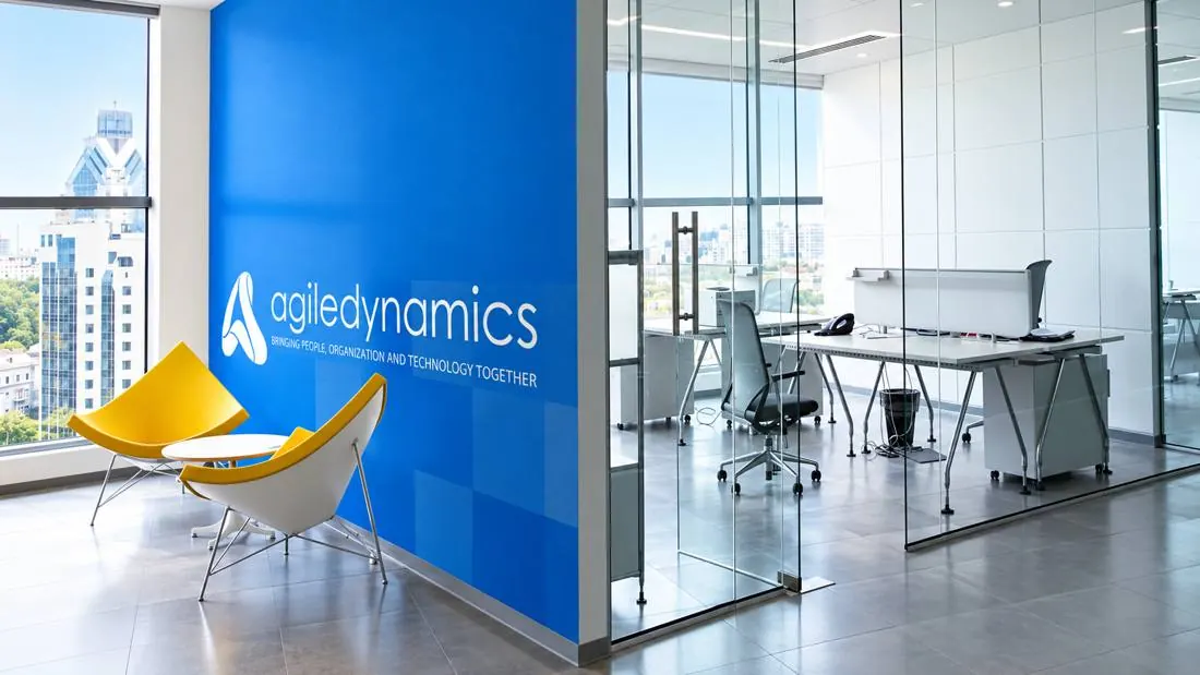 Agile Dynamics office with branded wall